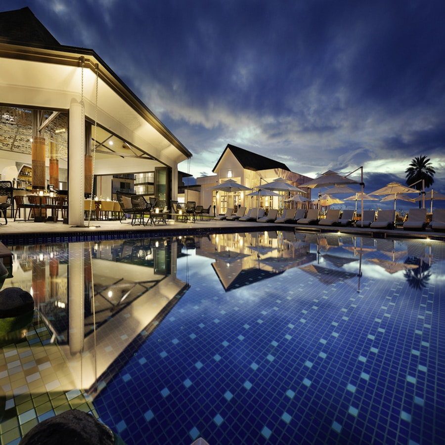 Luxury resort infinity pool with ocean view